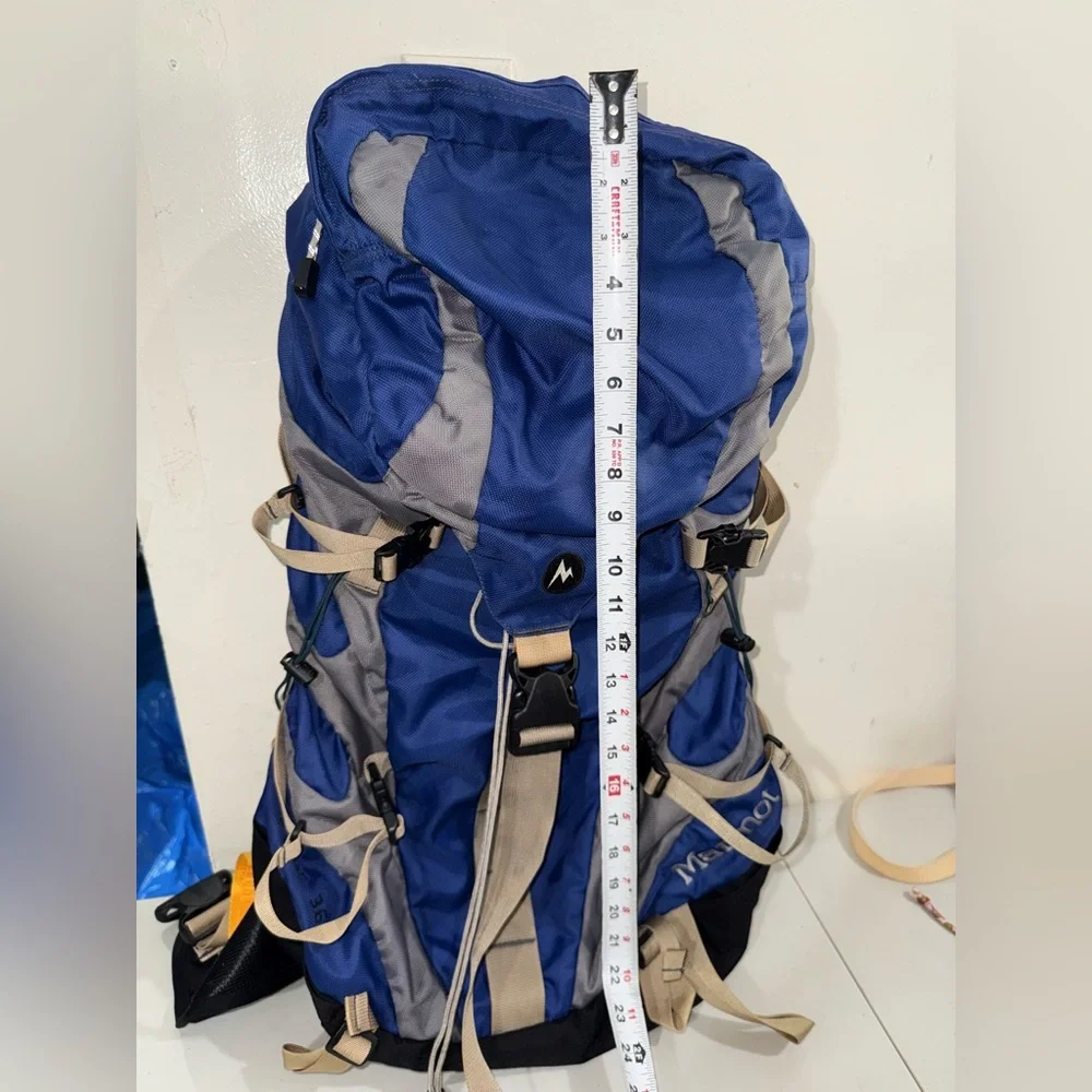 Marmot Blue and Gray Hiking Backpack with Tan Straps